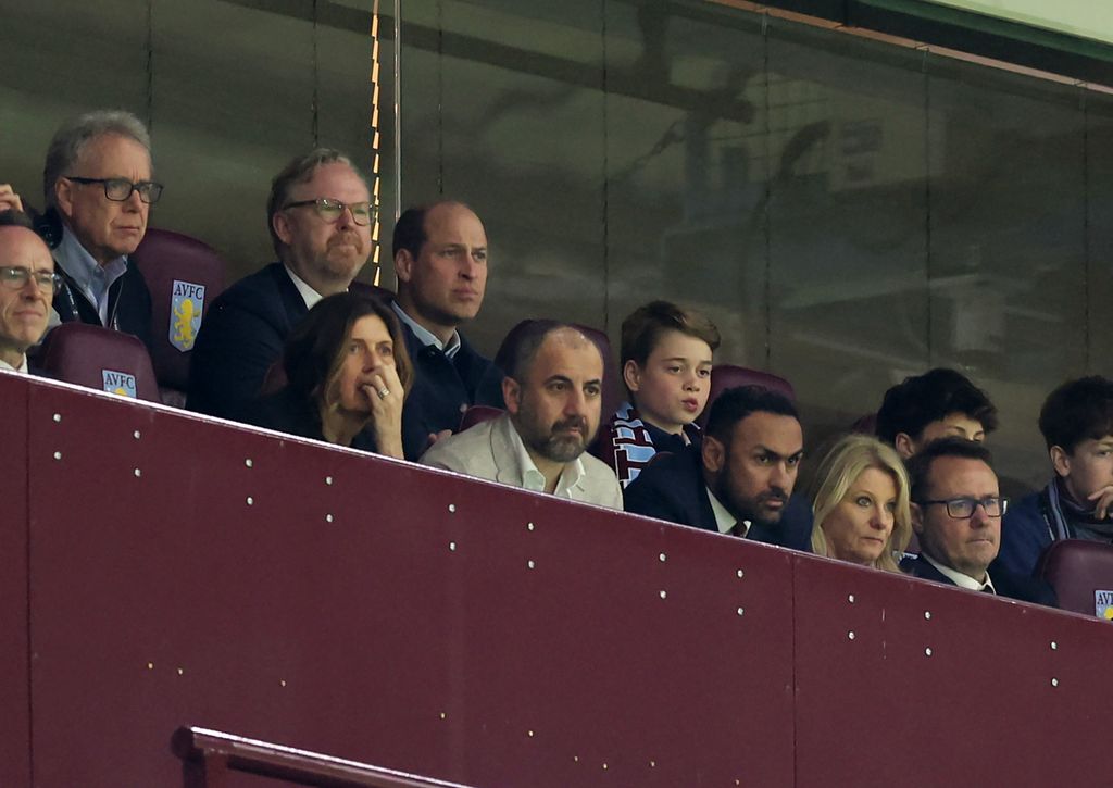 Prince William, Prince of Wales and Prince George of Wales watch from the stands during the UEFA Europa Conference League 2023/24 Quarter-final first leg match between Aston Villa and Lille OSC 