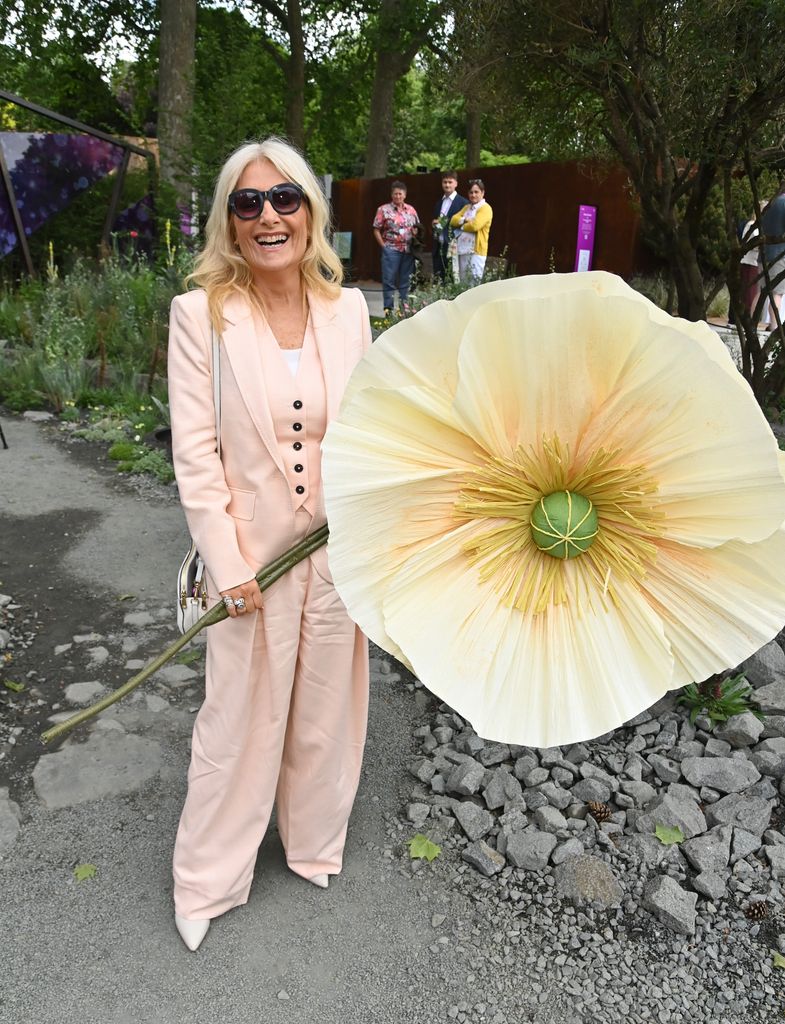 gaby rosling in peach trouser suit