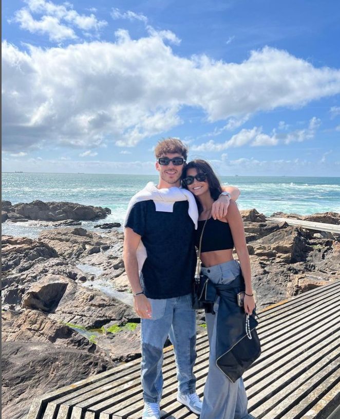 Pierre Gasly with his arm around Francisca Cerqueira Gomes
