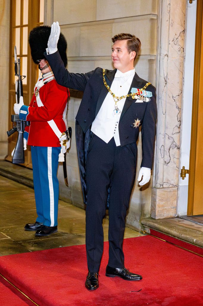 danish royal waving in white tie 