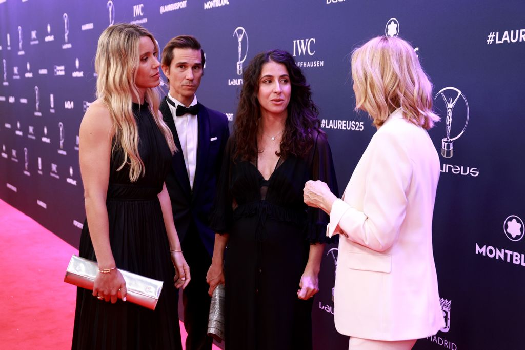 Mery Perello in a black plunging dress on the red carpet
