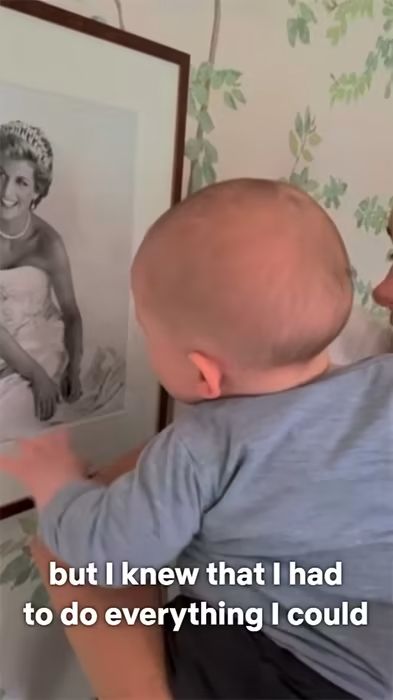 archie being shown princess diana photo