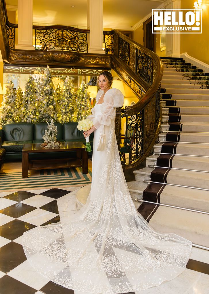 Maeva D'Ascanio wearing second wedding dress with sheer lace cape 