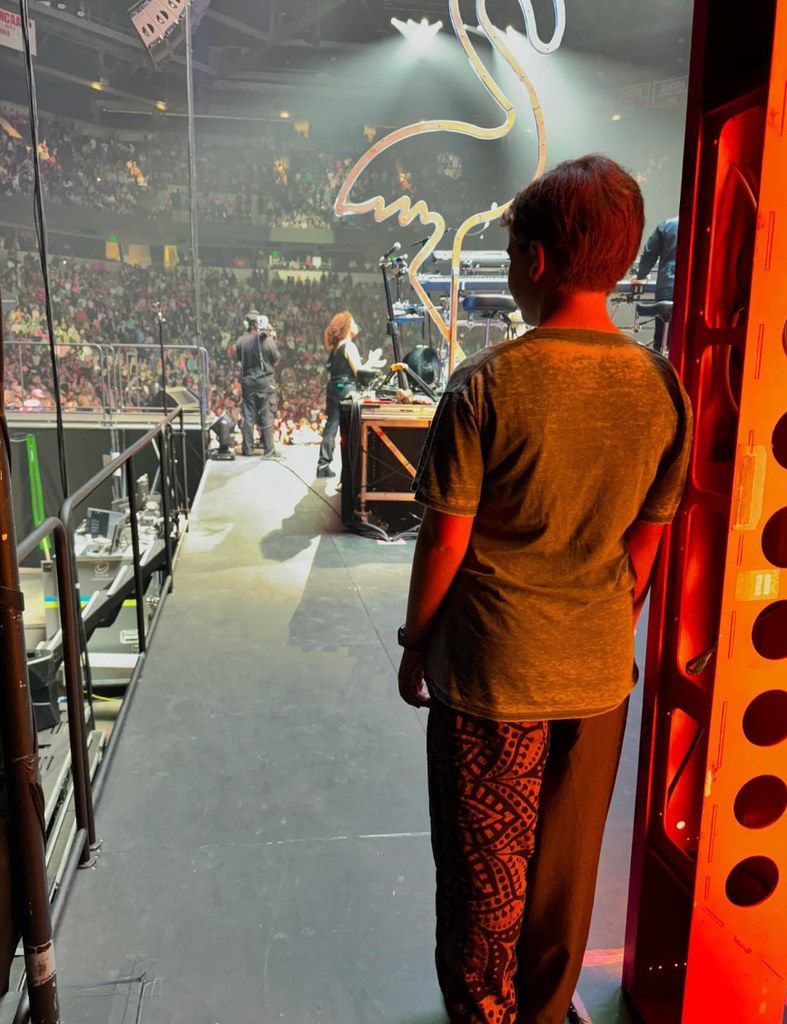 Photo shared by Pink's husband Carey Hart of her last Summer Carnival tour show, of their daughter Willow watching from backstage