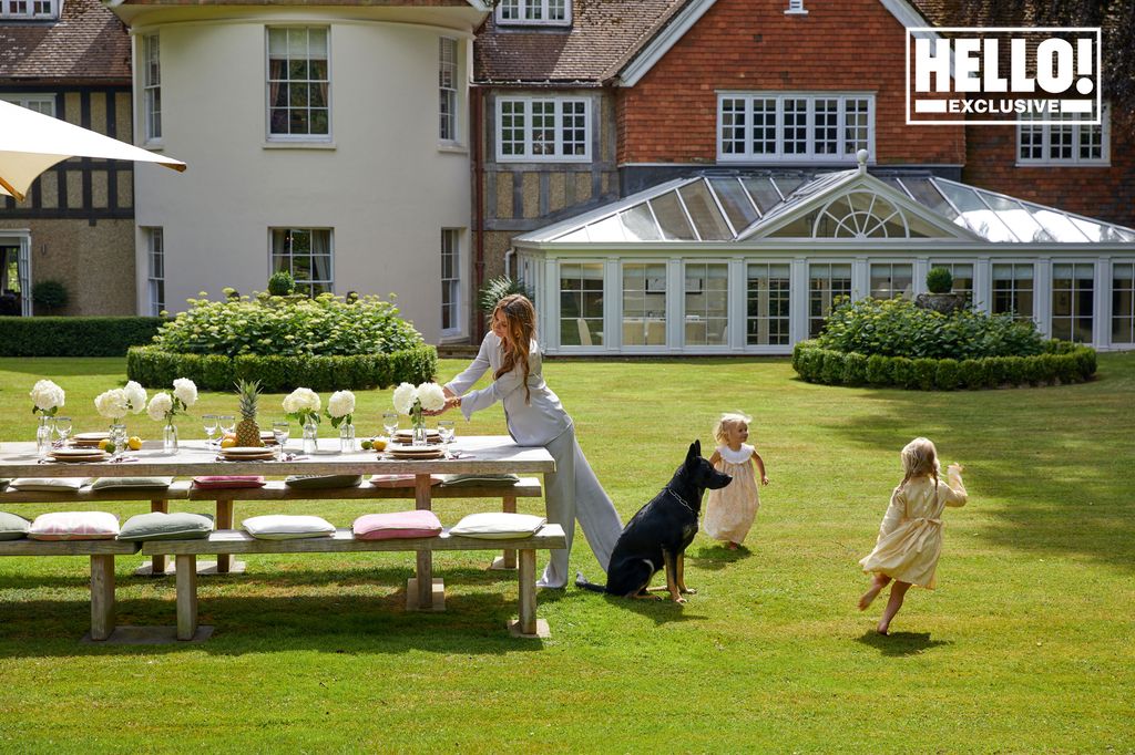 Yoanna Hanbury at home in Berkshire with daughters and dog 