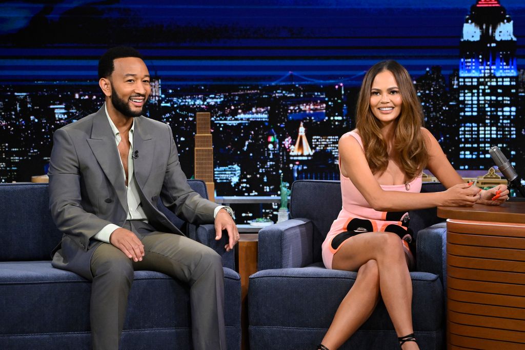 THE TONIGHT SHOW STARRING JIMMY FALLON -- Episode 1965 -- Pictured: (l-r) John Legend and Chrissy Teigen during an interview on Thursday, May 2, 2024 -- (Photo by: Todd Owyoung/NBC via Getty Images)