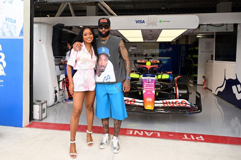 Odell Beckham Jr and Keke Palmer in the pitlane prior to the F1 Grand Prix of Miami at Miami International Autodrome on May 05, 2024 in Miami, Florida. (Photo by Rudy Carezzevoli/Getty Images)
