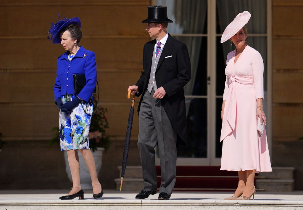 Sophie, Duchess of Edinburgh in soft pink with Prince Edward and Princess Anne