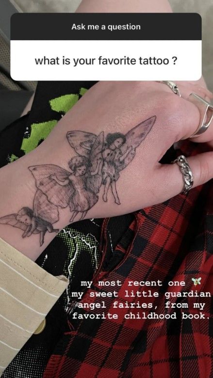 billie eilish fairy tattoo on left hand 