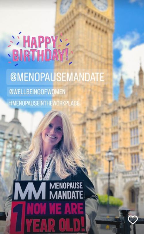 Penny Lancaster holding a Menopause Mandate placard