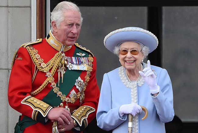Charles with Queen Elizabeth on the royal balcony