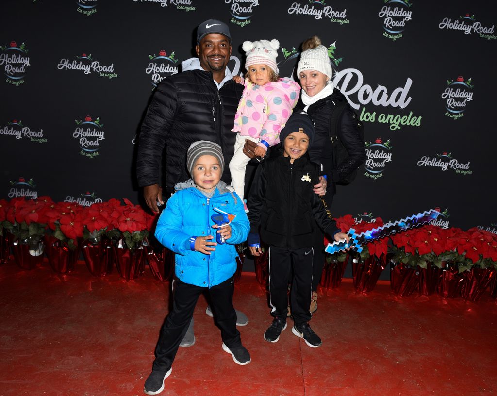 Alfonso Ribeiro, Angela Unkrich and their kids Alfonso Ribeiro, Jr., Ava Ribeiro and Anders Ribeiro attend the Holiday Road Friends & Family Preview Night 2021 at King Gillette Ranch on December 04, 2021 in Calabasas, California