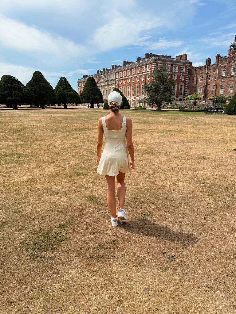 emily andre by hampton court palace in mini dress