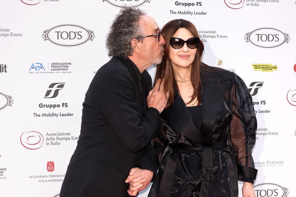 Tim Burton and Monica Bellucci attend the 64th "Globo d'Oro" Awards