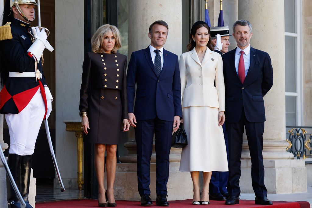 President Macon, First Lady Macron pose for a photo with King Frederik and Queen Mary