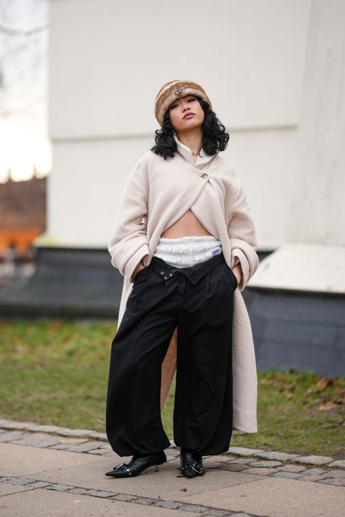 Ruffled silky bloomers beneath baggy jeans is a perfect pairing in Copenhagen. 