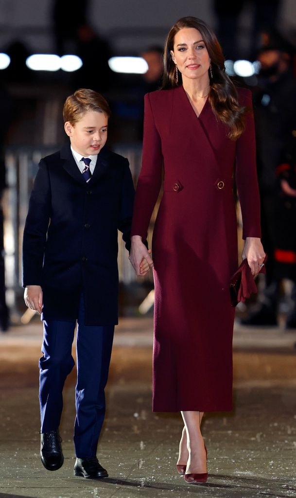 George and Kate hold hands at Christmas concert