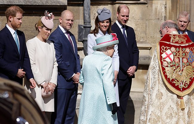 Prince Harry, Zara and Mike Tindall and William and Kate looking on as the late Queen passes them