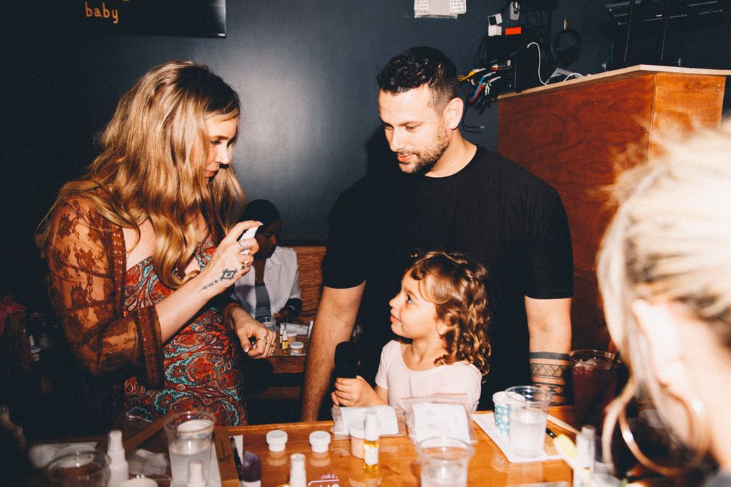 Joss Stone chatting to child at Ease event