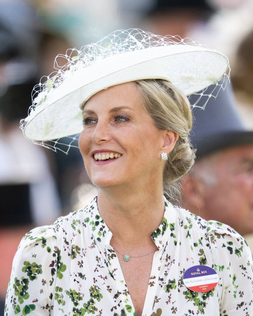 Sophie, Duchess of Edinburgh smiling shoulders up in white hat