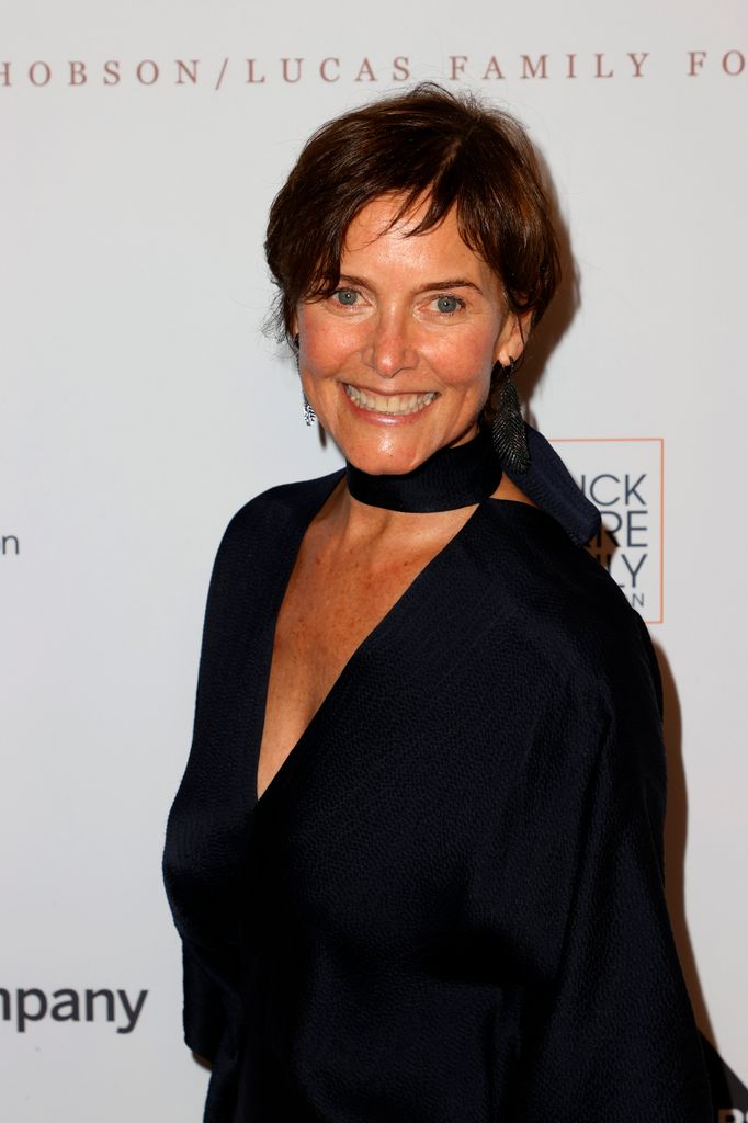 Carey Lowell smiling