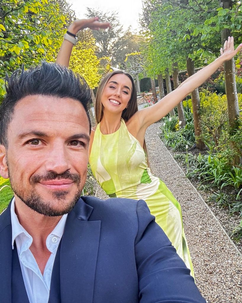 couple taking selfie outside 