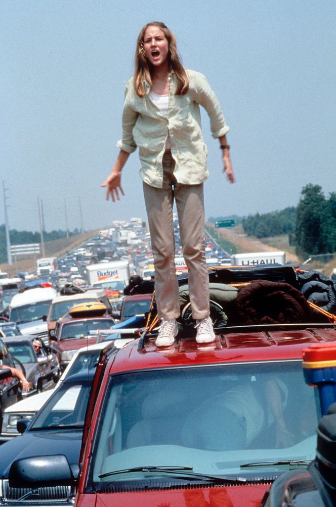 Leelee in Deep Impact standing on a car in famous scene