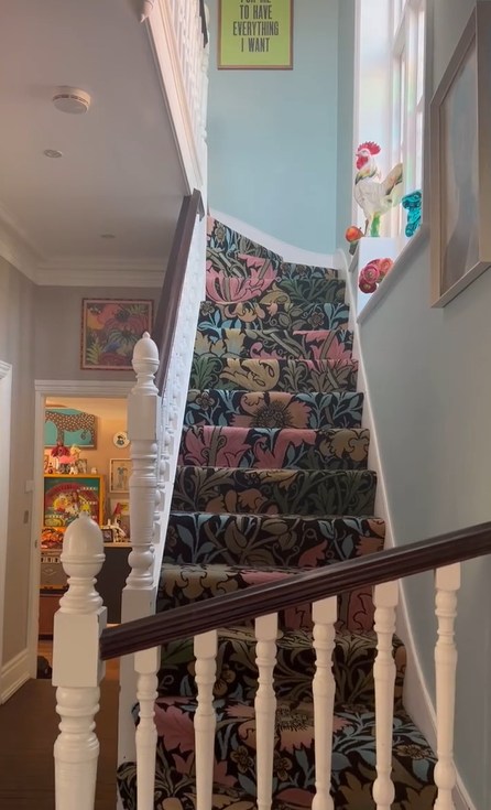 staircase with bold printed carpet
