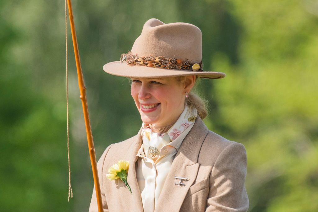 Lady Louise Windsor wearing hat riding carriage