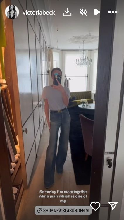 Victoria Beckham wears flared jeans on Instagram with high heels and a grey T-shirt