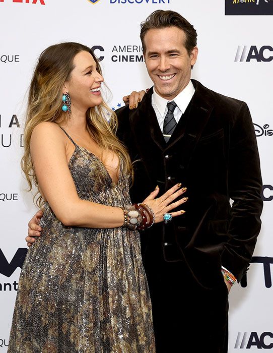 A pregnant Blake with husband Ryan Reynolds on a red carpet