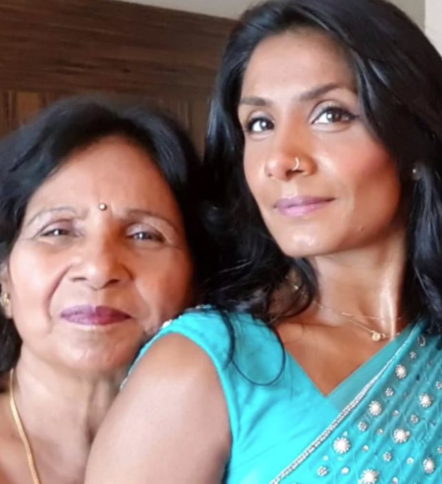 Balvinder Sopal standing with her late mother