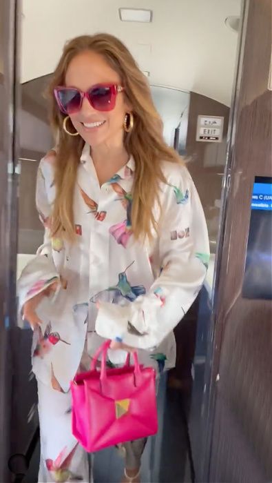 jennifer lopez inside private jet valentino bag quay sunglasses