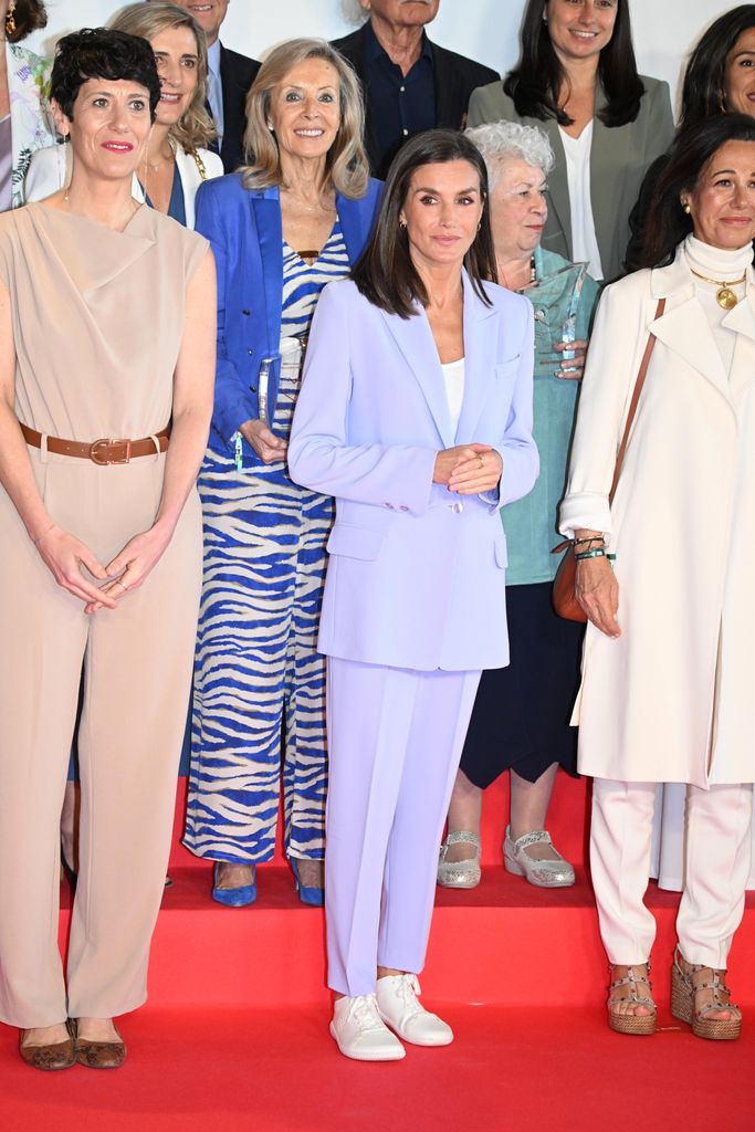 Queen Letizia in lilac suit