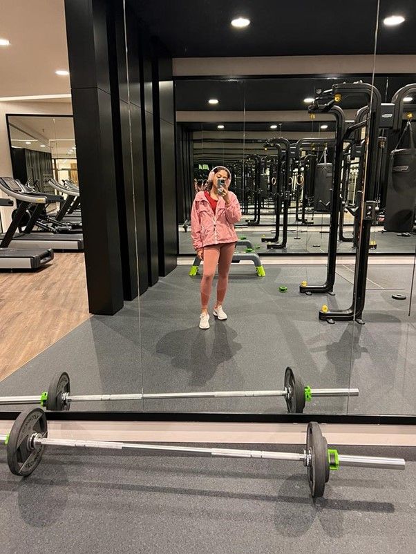 Woman in pink in the gym