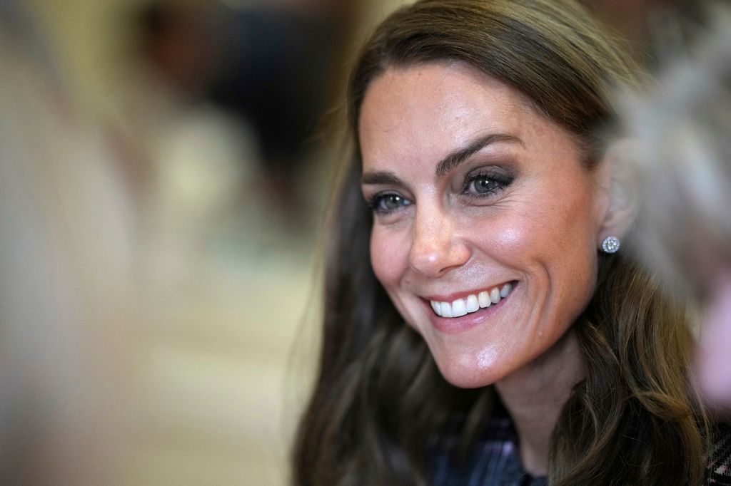 Britain's Catherine, Princess of Wales smiles during a visit with Britain's Prince William, Prince of Wales to the National Federation of Women's Institute (WI) in Sunningdale, west of London on September 8, 2025, to commemorate the three-year anniversary of the death of William's late grandmother Queen Elizabeth II. The Prince will meet with members from Sunningdale WI there and across Berkshire to hear about the work of the WI and how it gives opportunities for women to socialise, learn new skills and engage in community projects. (Photo by Alastair Grant / POOL / AFP) (Photo by ALASTAIR GRANT/POOL/AFP via Getty Images)          