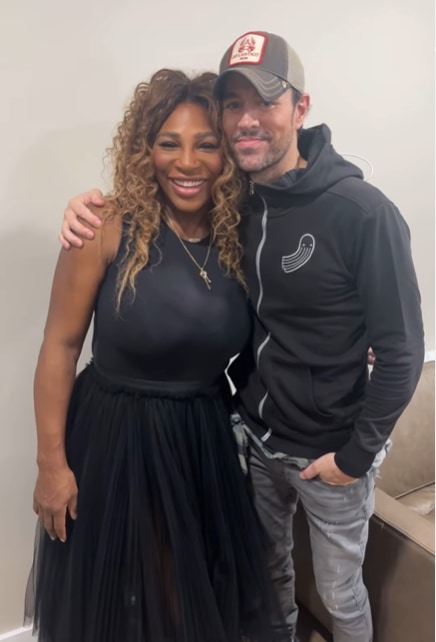 Serena Williams in a black tulle skirt with Enrique Iglesias
