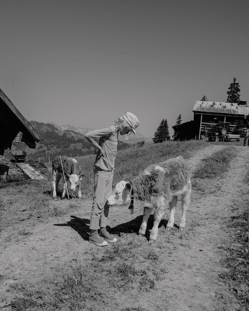 Eric Christian Olsen and Sarah Wright Olsen's son Wyatt stands on a farm