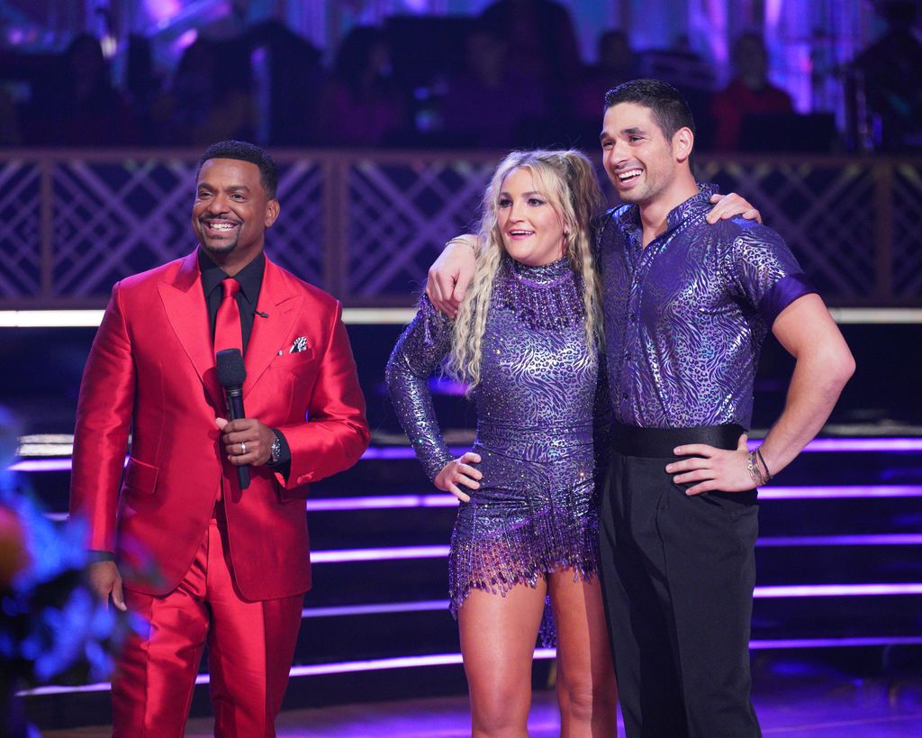 Jamie Lynn and Alan Bersten stand with Alfonso Ribeiro