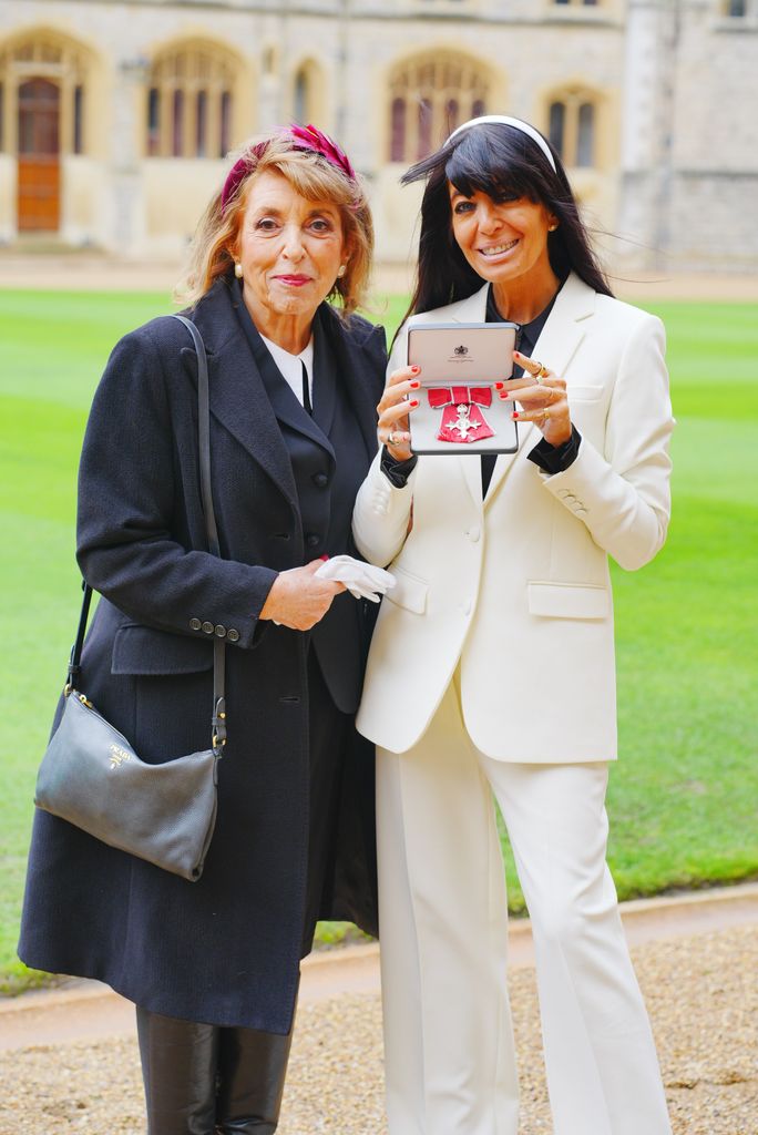 Claudia Winkleman (R) with her mum Eve Pollard after being made a Member of the Order of the British Empire during an Investiture ceremony at Windsor Castle on December 9, 2025 in Windsor, England.  (Photo by Ben Birchall - WPA Pool/Getty Images)