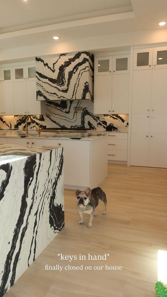 photo of black and white marble in simone biles kitchen