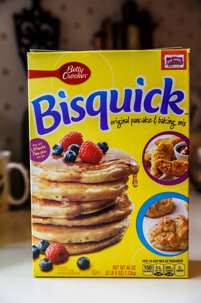 Betty Crocker Bisquick original pancake and baking mix. Prepared mix ready to bake pancakes, muffins and biscuits fast and easy. Cheerful yellow boxed packaging with box tops label in the corner.