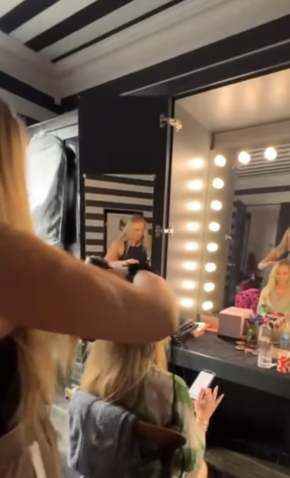 Amanda Holden sits in dressing room while getting hair done