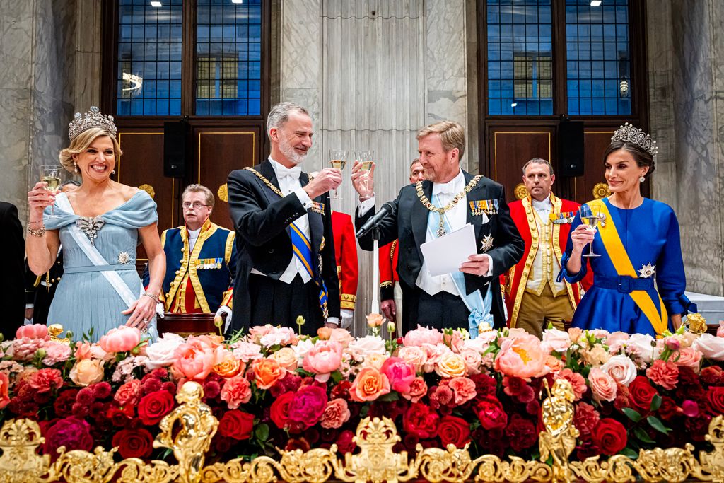 Queen Maxima at banquet raising toast with King Willem-Alexander, King Felipe and Queen Letizia