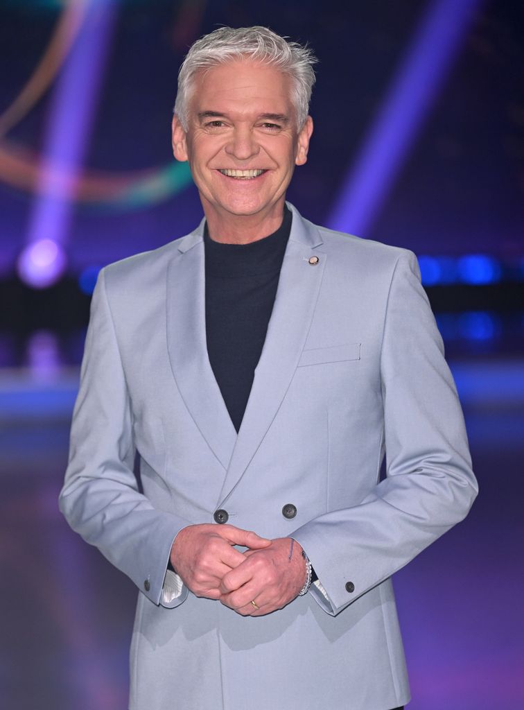 Phillip Schofield in a gray suit and wedding ring at the Dancing On Ice photocall in January 2023