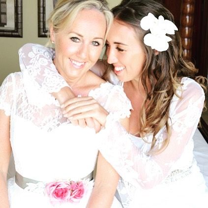 Shirlie Kemp in a lace wedding dress with her daughter Harley Moon