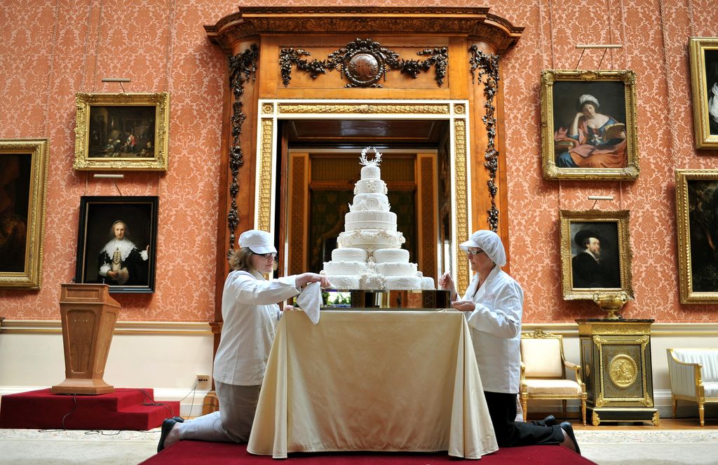  Rachel Jane Eardley (left) and Diane Pallett put the finishing touches to the Royal wedding cake, that Fiona Cairns and her team made for Prince William and Kate Middleton, in the Picture Gallery of Buckingham Palace in central London, today.  