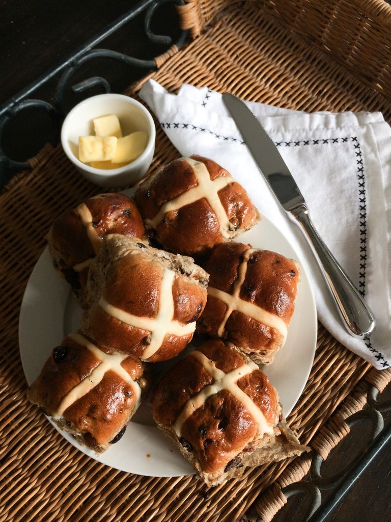 Hot cross buns on rattan tray ready for eating