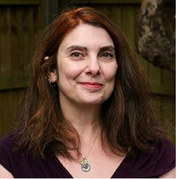 An image of Liza Frank - the author of Household Lore - looking into the camera