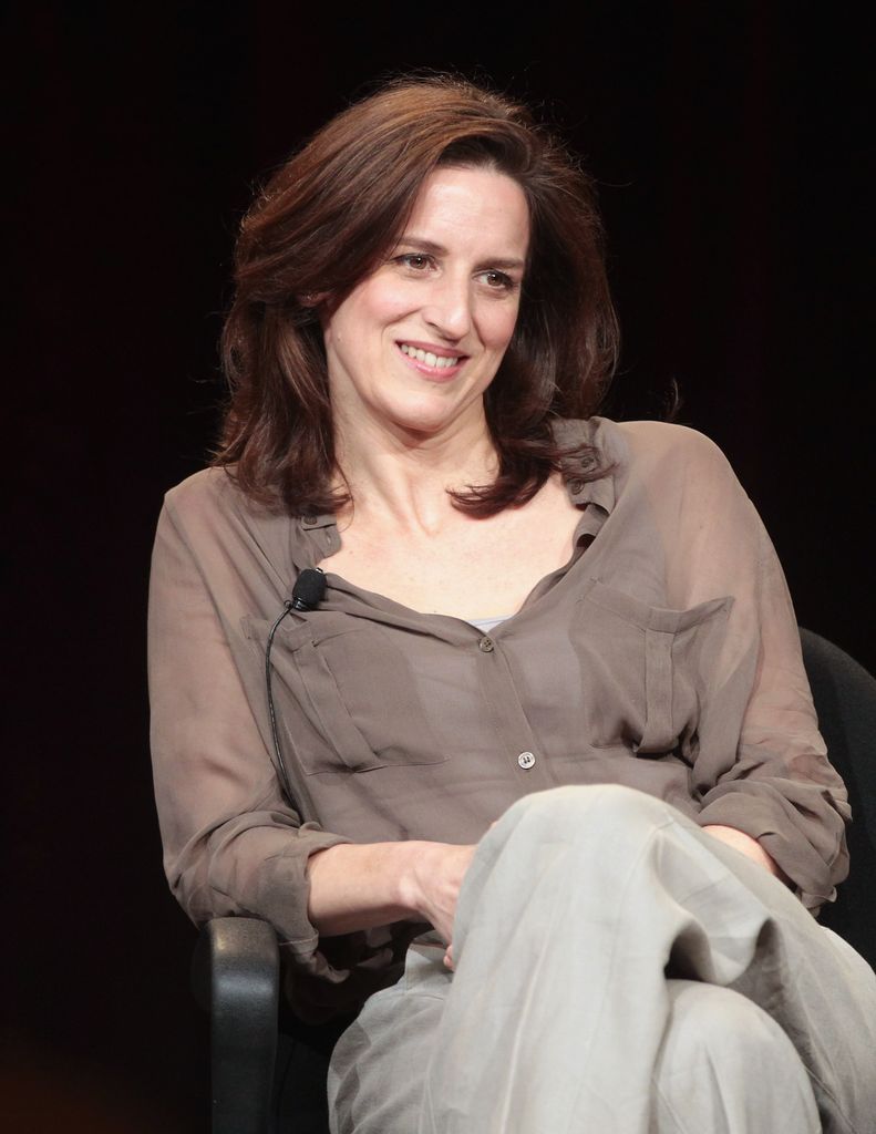 Abigail Thaw sitting during a press conference